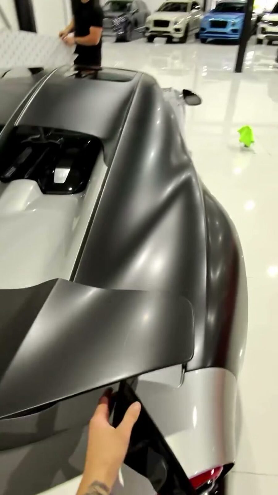 Close detail of satin film on a supercar panel